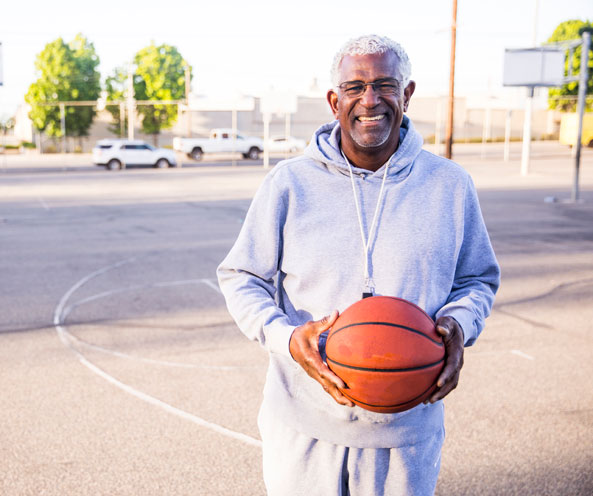 Man holding basketball