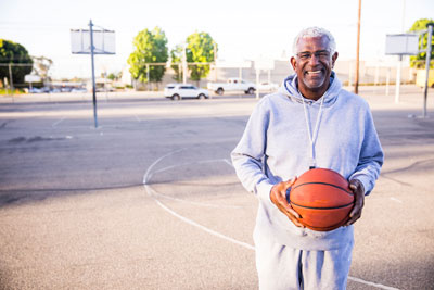 Man holding basketball