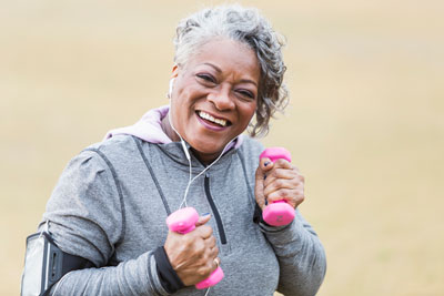 Woman with small barbells